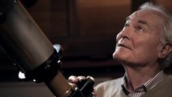 Old man in observatory Stock Footage