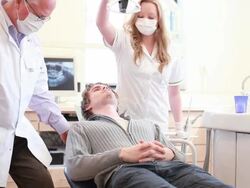 Welcoming patient in the dental office with handshake. Stock Footage
