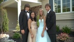 MS, Two young couples in prom attire posing in front of house, portrait, Edison, New Jersey, USA Stock Footage