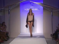 Models walk the runway during the Aqua Di Lara Swimwear 2011 fashion show at the Aqua Di Lara/Qiss Qiss - Runway - MBFW Miami Swim 2011 Stock Footage