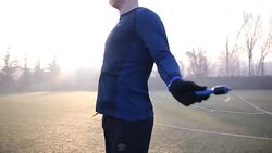 Man skipping on rope on cold winter day Stock Footage