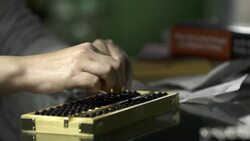 Accountant Using Traditional Chinese Maths Tool Abacus Stock Footage