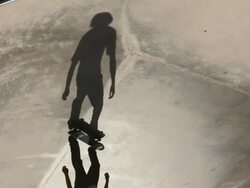 WS Shadow of Young man skateboarding and kick flipping in skatepark/Singapore Stock Footage