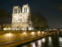 HD Timelapse: Notre Dame Cathedral at night in Paris, France Stock Footage