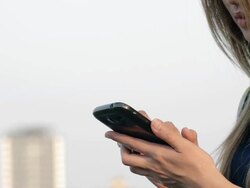 girl using smart phone urban scene Stock Footage