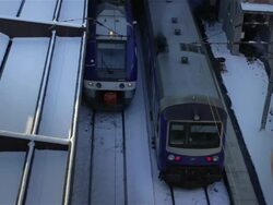 Train departs from station, high-angle Stock Footage