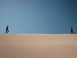 Businesspeople in desert Stock Footage
