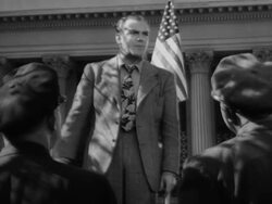 Prejudiced man preaching to street crowd Stock Footage