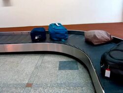 bag conveyor in airport terminal Stock Footage