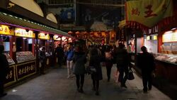 China, Beijing, Food stalls in Wanfujing Dajie Street, Beijing's main shopping street at night Stock Footage