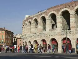 MS T/L Shot of Tourists roaming in front of Arena di Verona at Piazza Bra / Verona, Veneto, Italy Stock Footage