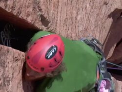  MS Climber slowly making ground on wide crack / Zion,UT,USA Stock Footage