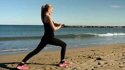 Sport girl stretching with smart watch Stock Footage
