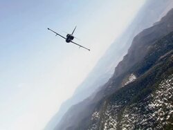 AIR TO AIR, WS, Two Aero L-39 Albatroses flying over Mojave Desert hills, California, USA Stock Footage