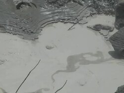 Volcanic pond with bubbles Stock Footage