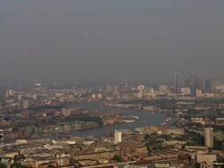 Aerial of London cityscape with Canary Wharf in distance Stock Footage