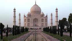 A pool in the charbagh reflects the Taj Mahal in Agra, India. Stock Footage