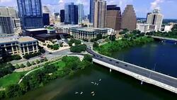Aerial Over Austin Texas Skyline Cityscape Close to Downtown Texas state capital city Stock Footage