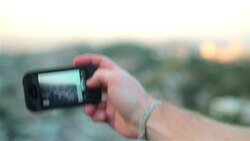 Tourist snaps photo of Rio de Janeiro skyline with smartphone Stock Footage