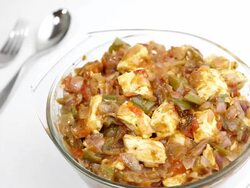 Delicious home made semi dry Indian Shimla Mirchi Paneer Stock Footage