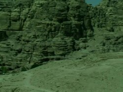 Petra archaeological site, base of mountain pan, Jordan Stock Footage