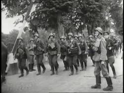 German soldiers raise a barricade and assume battle positions along the road during the invasion of Poland. News Clip