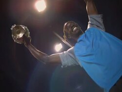 CU, LA, CANTED, Male tennis player holding trophy, night, Santa Barbara, California, USA Stock Footage