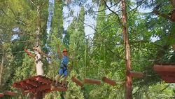 boy in the municipal rope park Stock Footage