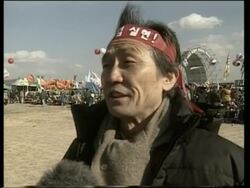 Farmers across the country gather for anti-WTO demo News Clip