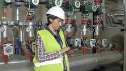 Female stationary engeneer at work Stock Footage