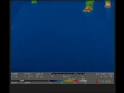 Thermographic imaging, CU feet walking into frame to camera, leaving thermal footprints Stock Footage