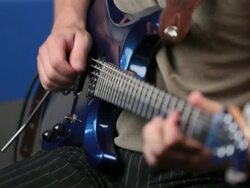 Man playing an Electric guitar Stock Footage