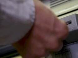 Man inserting bank card into cash machine Stock Footage