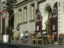 MS People sitting out of restaurant  / Prague, Hlavni mesto Praha, Czech Republic Stock Footage