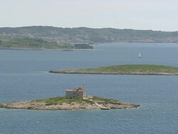 WS AERIAL View of light house in Adriatic sea / Korcula, Dubrovnik Neretva County, Croatia Stock Footage