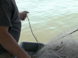 Fishermen pull an empty net from the Chesapeake Bay Stock Footage
