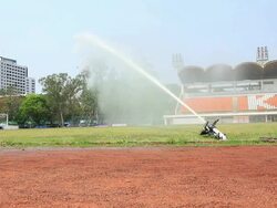 Automated sprinkler in a football stadium Stock Footage