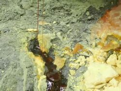 MS TU Liquid sulfur at the Ijen volcano crater / Ijen, Java, Indonesia Stock Footage