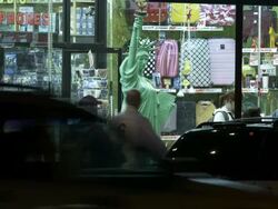 A mini Statue of Liberty sits outside of a novelty shop in New York City Stock Footage