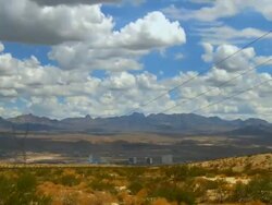 T/L, WS, Clouds moving above Laughlin and surrounding desert, Nevada, USA Stock Footage