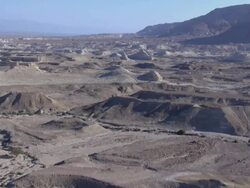 Aerial marlstone formations near Masada, Dead sea area, Judea Desert, Israel Stock Footage