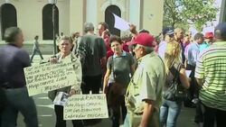 Crowds continue to gather to mourn death of President Chavez News Clip