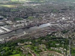 Aerial wide shot pan Cork and Cork Harbour / Ireland Stock Footage