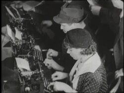 News reporters use telephones, telegraphs and typewriters to report on the execution of Bruno Hauptmann. News Clip