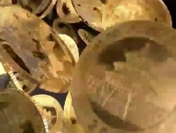 Computer animation of China Gold falling. Black background Stock Footage