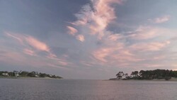 Sunset at river opening. Stock Footage