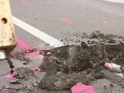 CU Shot of workmen Engraving on street for works at sewage pipe / Saarburg, Rhineland Palatinate, Germany Stock Footage