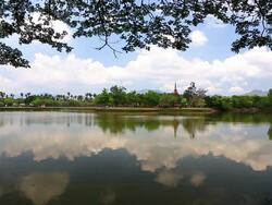 Temple with its reflection in Sukhothai historical park Thailand Stock Footage