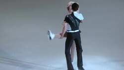 SLO MO Figure skating pair performing Stock Footage