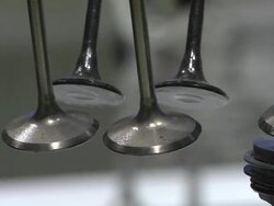 CU PAN Engine valves in Ford Motor Company internal combustion engine at Detroit Auto Show / Detroit, Michigan, USA Stock Footage